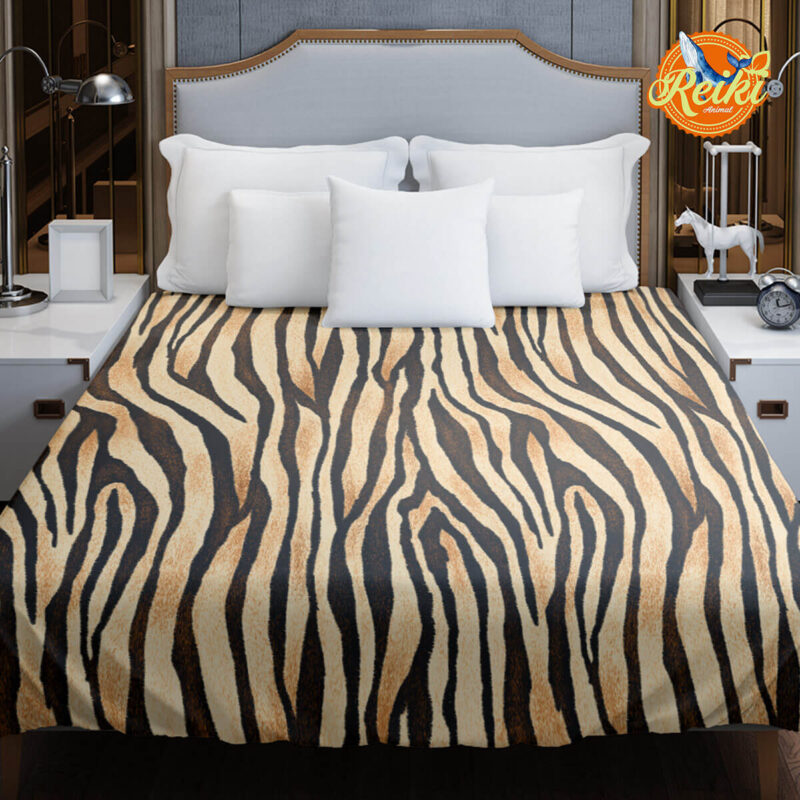 Niezwykła narzuta ochronna na łóżko "Zebra, która nie tylko wnosi ciepło i komfort do Twojej przestrzeni sypialnianej, poprzez zasady koloroterapii i naturoterapii.